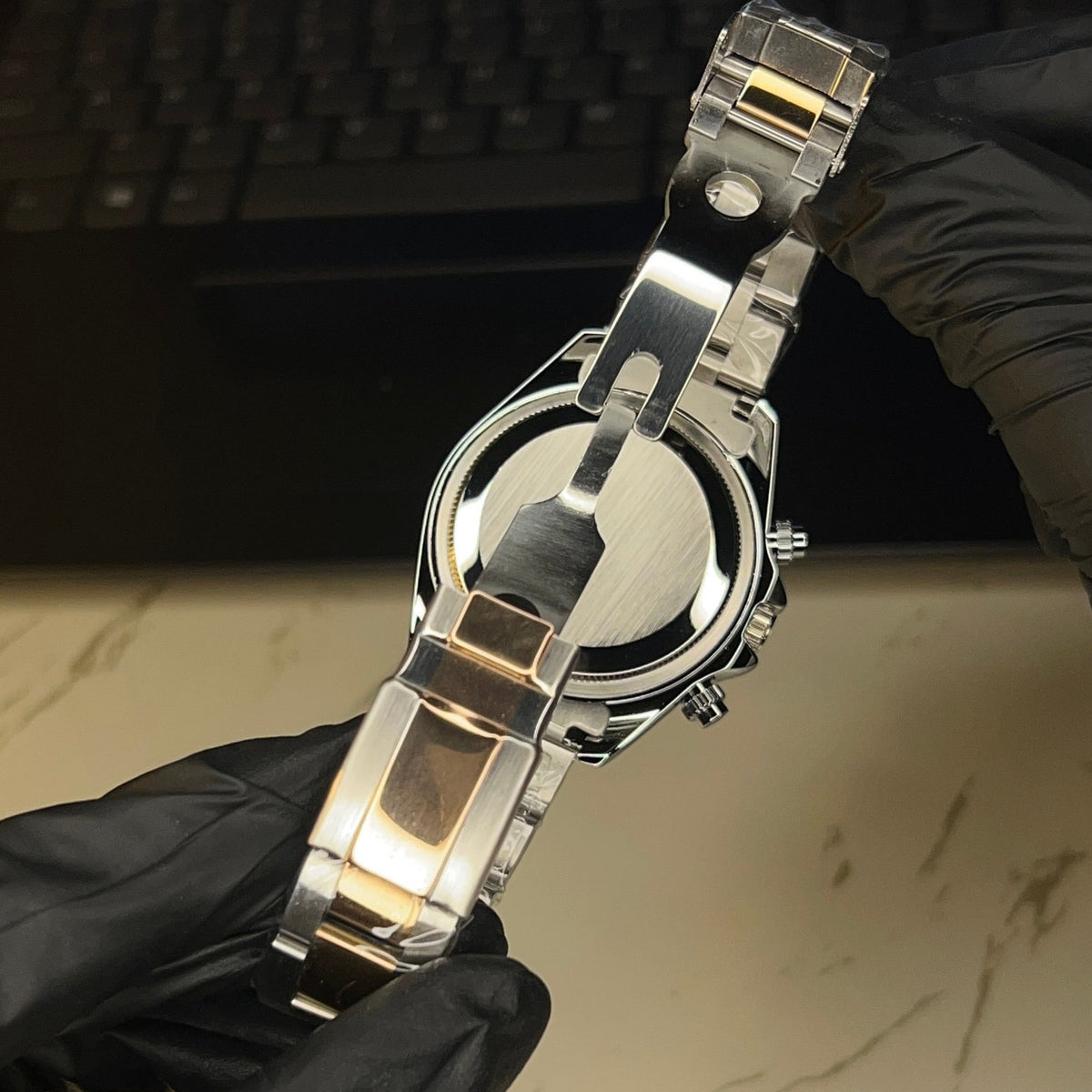 Two-tone men's luxury watch product photo