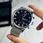 Hugo Boss Men’s Silver Mesh Strap Black Chronograph Dial Watch (Premium Edition)
