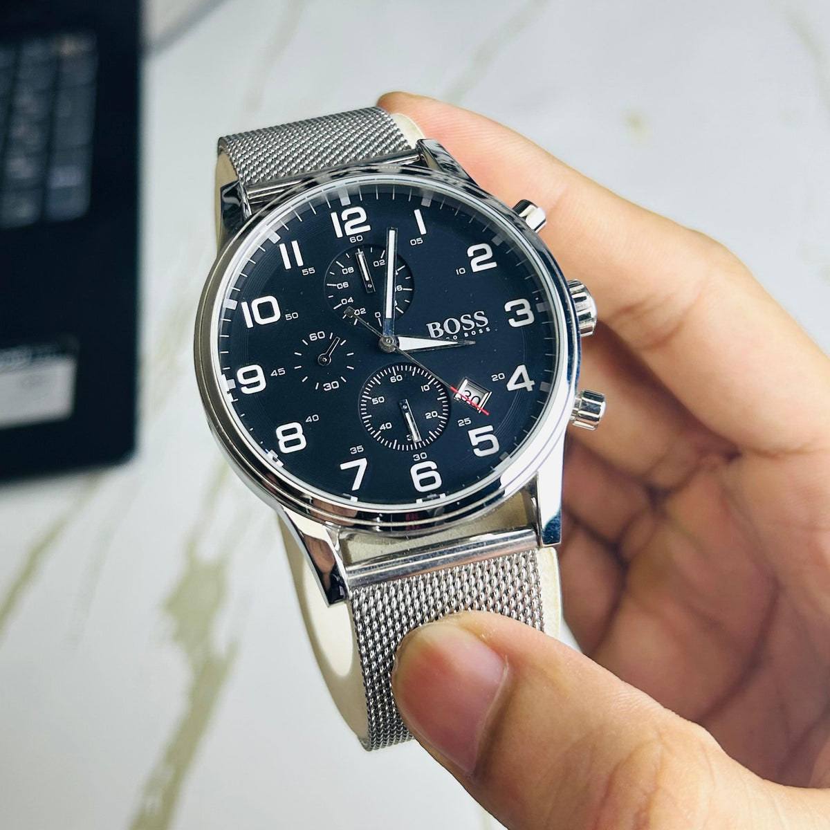 Hugo Boss Men’s Silver Mesh Strap Black Chronograph Dial Watch (Premium Edition)